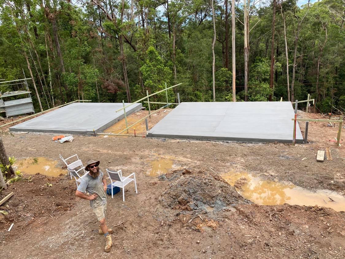 Jamie standing before two completed slabs